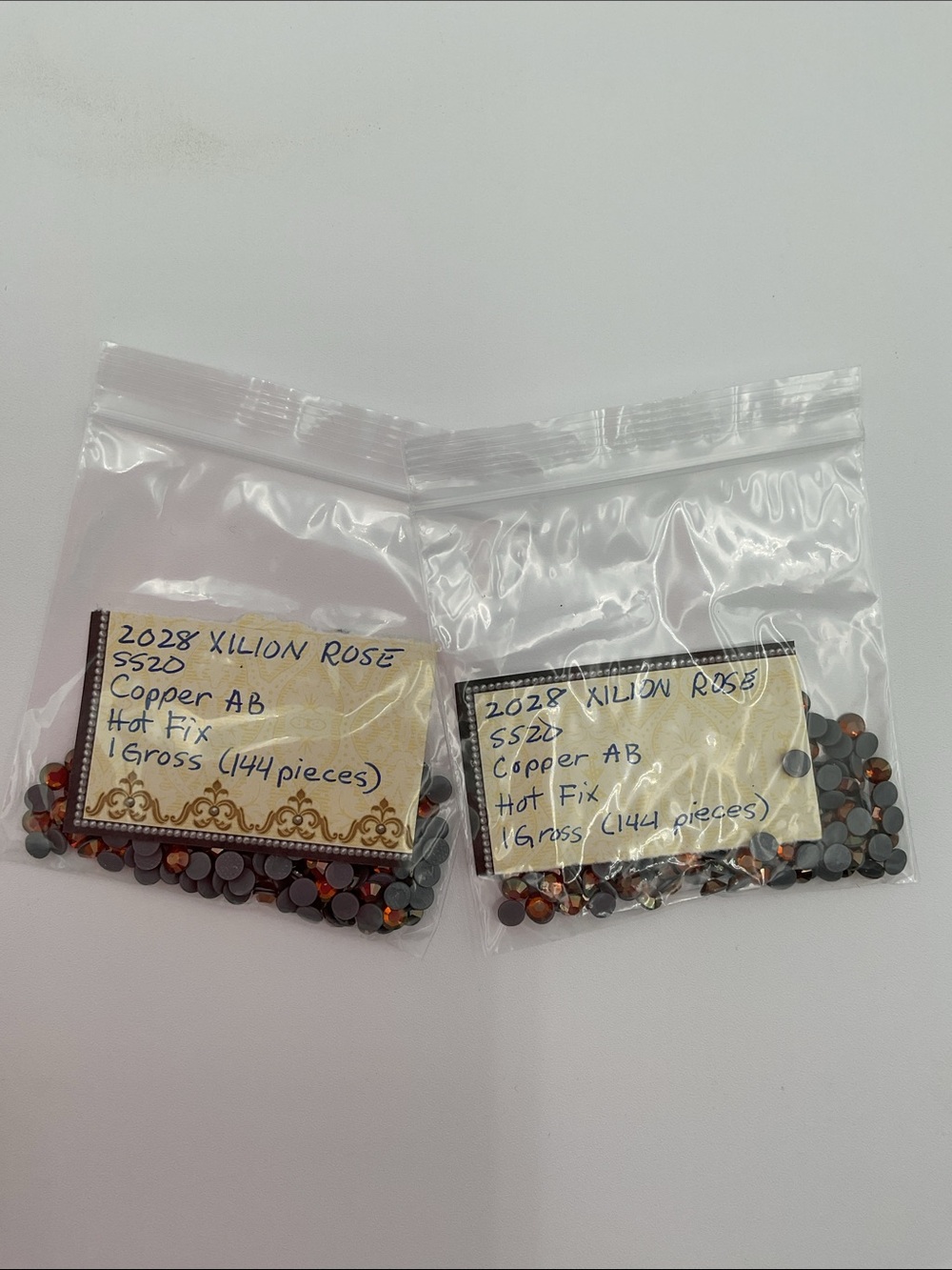 Swarovski • Color: Copper Aurora Borealis, 2028 XILION Rose Hotfix Rhinestones